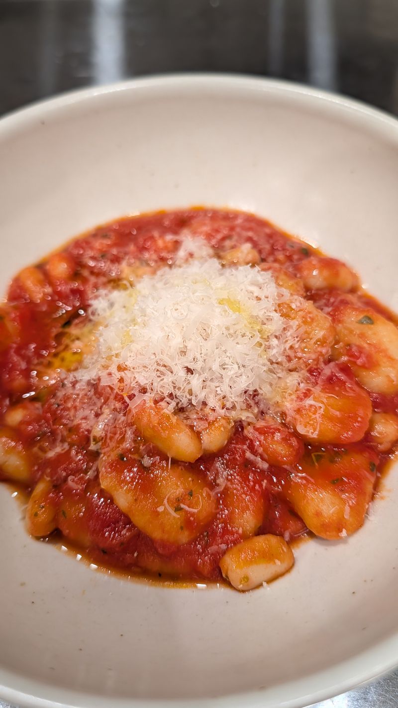 Gnocchi in tomato sauce with parmesan
