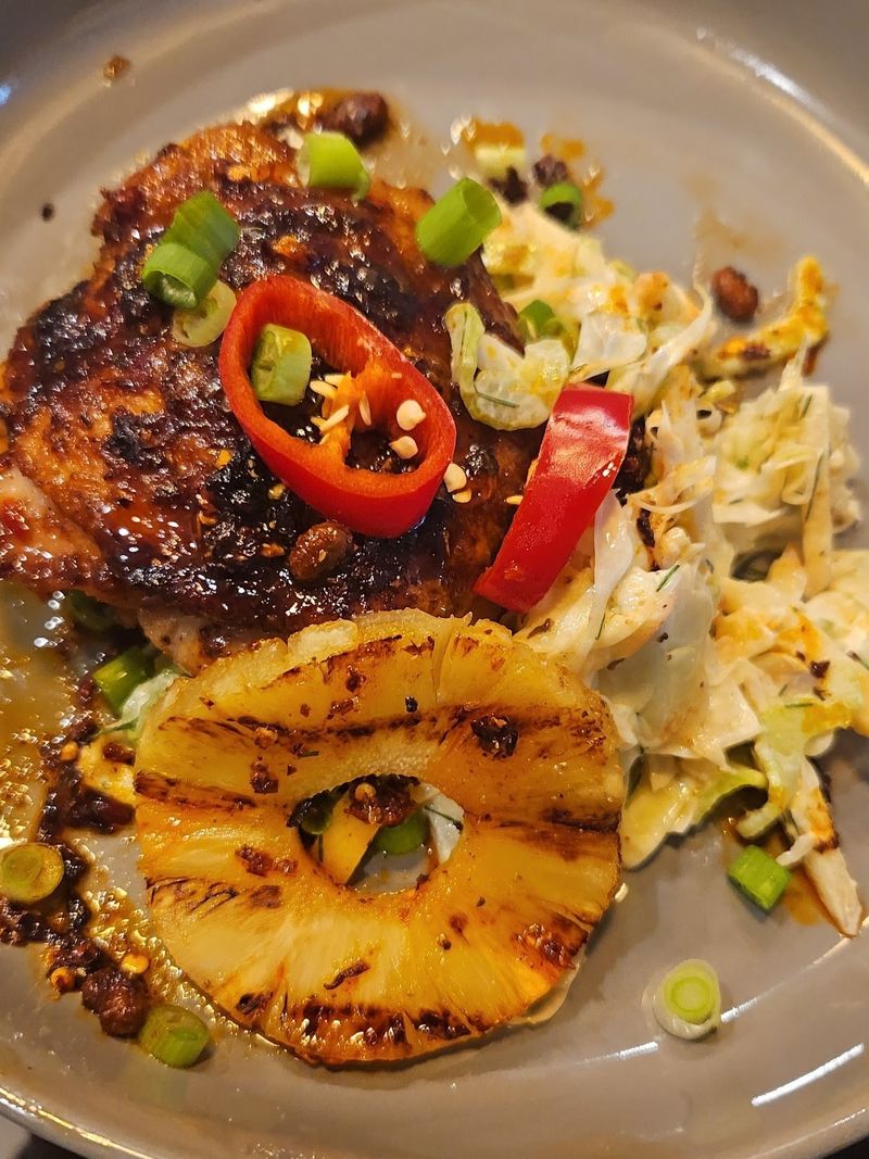 Jerk chicken with grilled pineapple and slaw